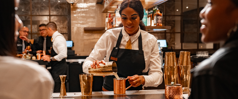 bartender-mixing-drinks-at-corona-steakhouse-nightlife-experience