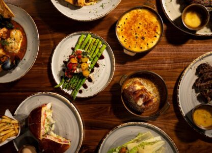 dinner-spread-at-corona-steakhouse-with-seafood-asparagus-desserts