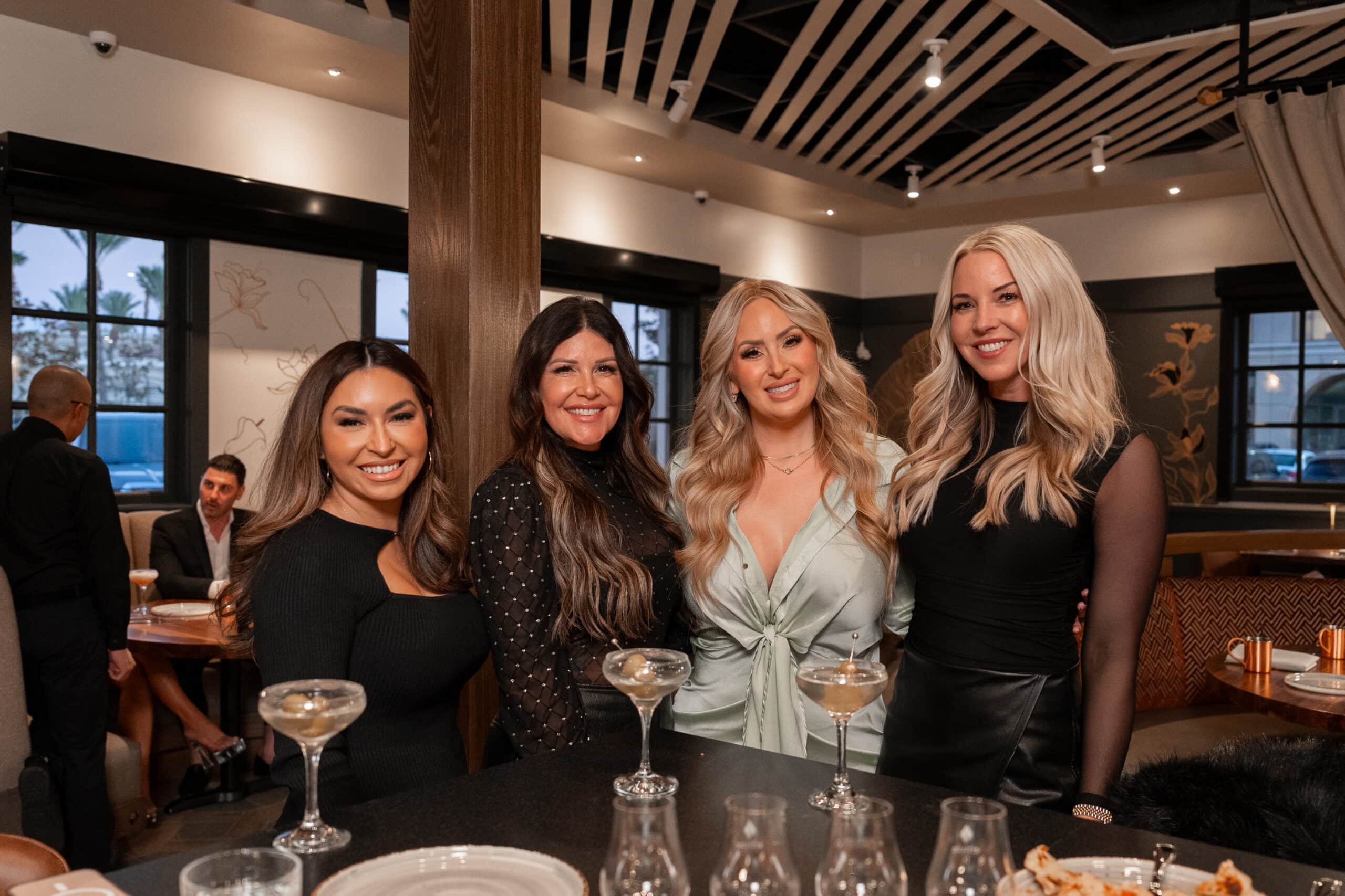 four-women-at-a-bar-with-cocktails-bars-corona-ca