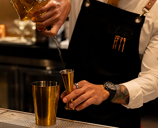 CISCo Bartender Pouring Whiskey