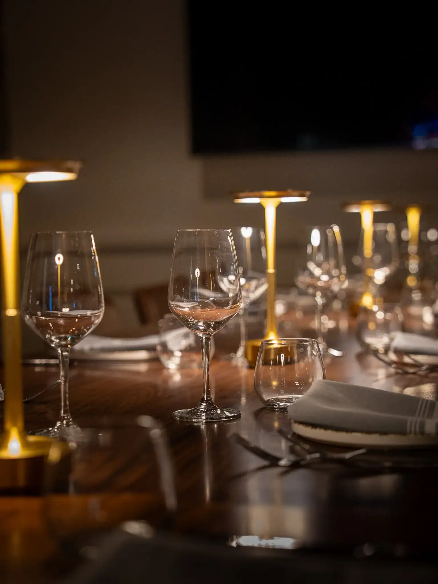 Private dining table in the O-Room at Cisco Restaurant with intimate warm lighting